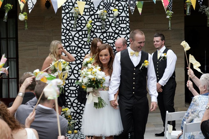 A Yellow DIY Wedding Bow Ties Pugs Balloons A Floral Sash