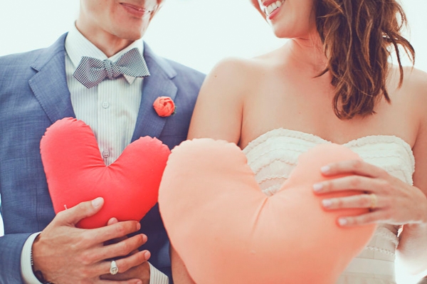 giant fabric hearts at wedding | heart themed wedding
