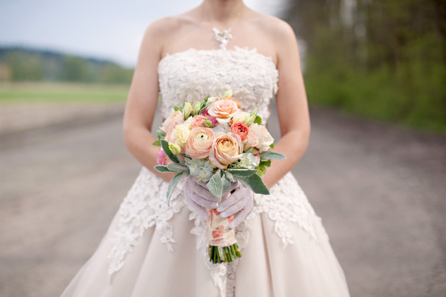 justin alexander wedding dress, peach bouquet and gloves