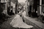 bride and groom dip kiss, Ian Stuart wedding dress